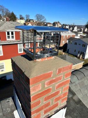 Chimney Rebuilt with new cap etc.