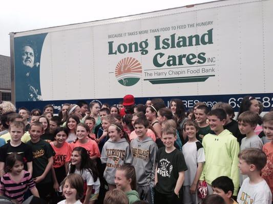 Nick Cannon's Food drive for Long Island Cares. That's him there in red