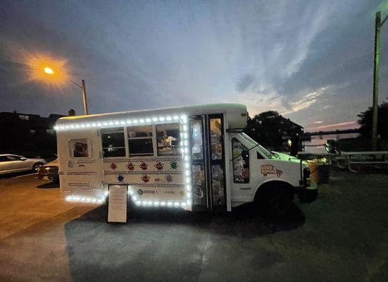 We took a school bus, emptied it, and created our Waffle & Ice Cream Truck!