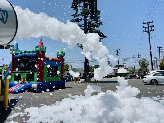 Kids summer camp foam party and bounce house. "Best day ever!" said one little boy.