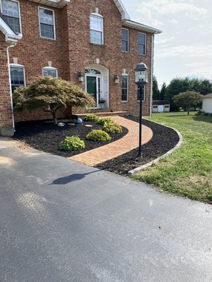 Complete transformation of front lawn with stone edging added