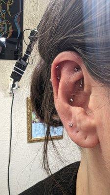 Helix piercing, rook piercing and conch piercing