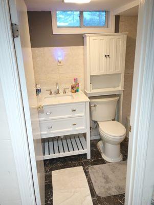 We turned this tiny basement bathroom into a beautiful space to be proud of! #1