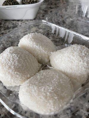 Chewy coconut-dusted "snowballs" filled with sugared peanuts... so delish! My mom's fav