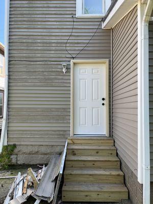 A customer needed a new door installed as well as a few horizontal pieces of siding replaced. This is a photo of the finished project.