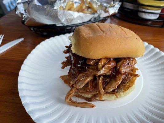 Pulled pork sandwich with fries