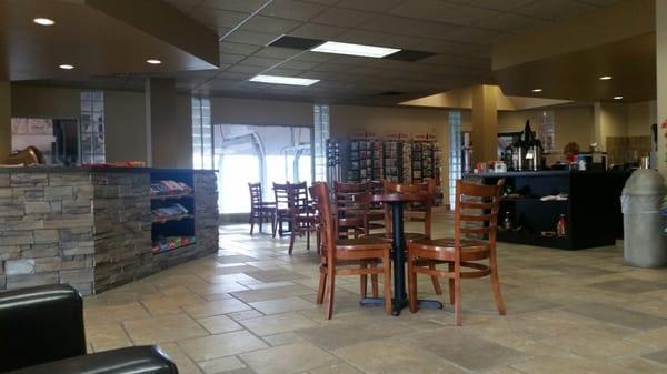 Great waiting area with snacks and coffee for purchase and a tv. You can see your car being cleaned through the windows