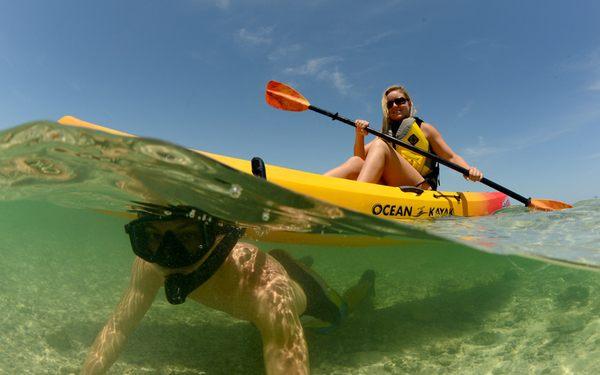 Mother and son exploring on a kayak