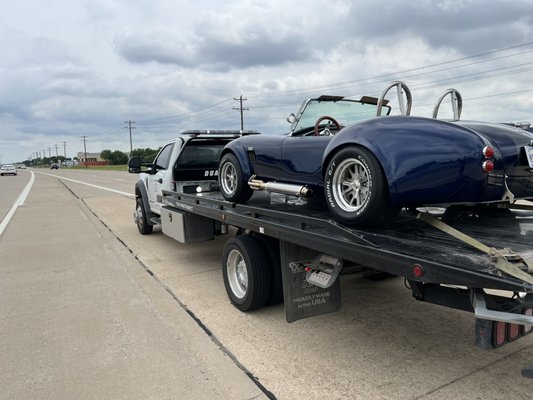 Towing a Shelby Cobra.