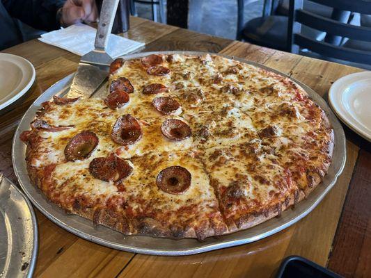 Large pizza, half pepperoni and half sausage