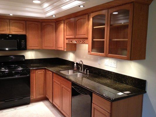 This is a finished Kitchen remodel in Long Beach in a condo.  Complete demo.  All new windows installed also w crown molding