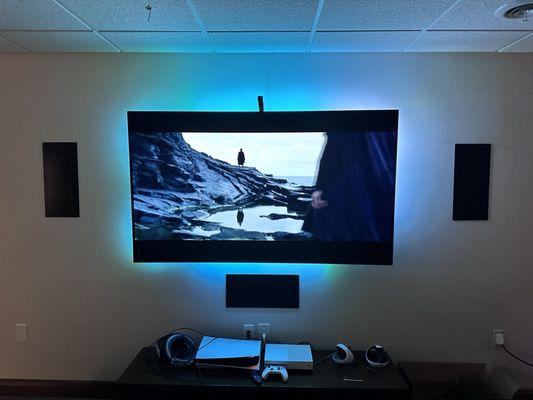 Media room with LED lights behind the TV