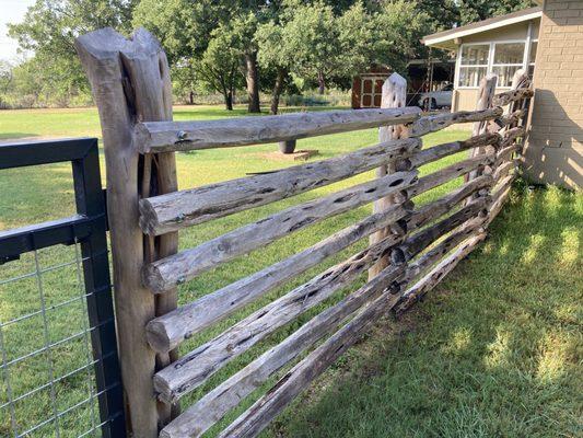 Hand-hewn cedar rail fence