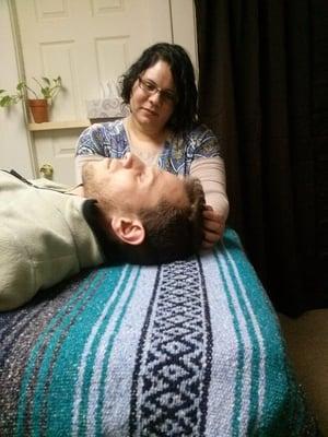 Shira Oz-Sinai offering acupressure.