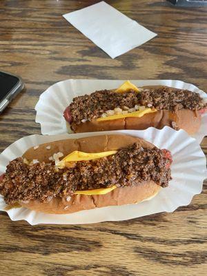 Chili  cheese  dog and mustard and onions