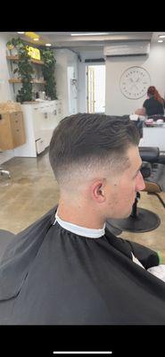 Skin Fade w/ Combover on top.