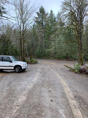 End of the access road with a widened area for large trucks to turn around as they're going to need to make a u-turn coming in or out.