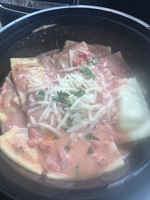 Red pepper sauce with five cheese ravioli