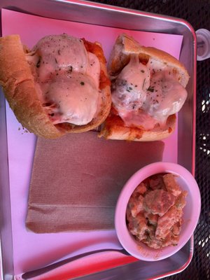 Meatball sub and barbecue potato salad.