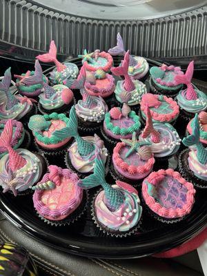 Custom mermaid cupcakes for my daughter's birthday. Beautiful, delicious and they definitely elevated the party!