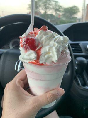 Cotton Candy sundae with marshmallow syrup, whipped cream and a cherry