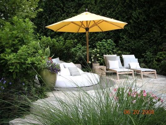 How to create a relaxing outdoor patio by the pool.