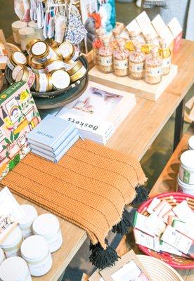 A wide assortment of candles, books, and gifts