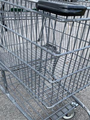 Unattended bargain hunt shopping cart that hit my car