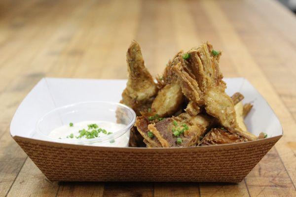 Delicate, crispy fried artichoke hearts served with our fancy yogurt sauce