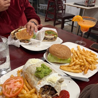 Carne asada burrito, cheeseburger deluxe, and carinatas torta