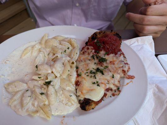 Chicken parmesan with white pasta on the side