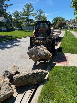 Planting mossy boulders