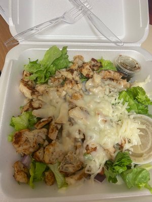 Salad with grilled chicken, Greek dressing and cheese