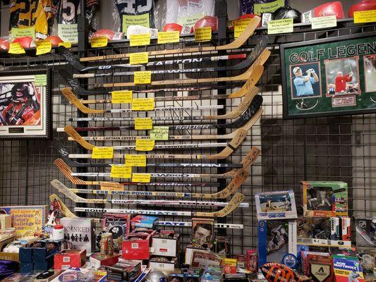 Used hockey sticks from known players.