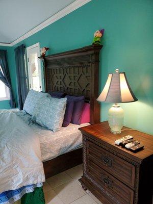 The Master Bedroom walls and ceiling painted and crown molding completed.