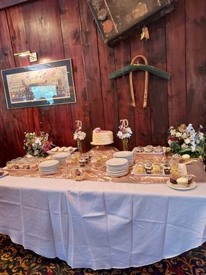 70th  Surprise birthday party dessert table.