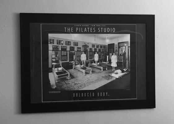 Framed print of Joseph Pilates in the original Pilates Studio in New York City