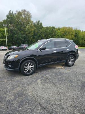 2015 Nissan Rogue with 167,000 miles.