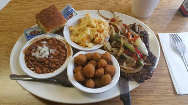 When it's good, it's good.  Same as last time - 8oz hamburger steak with peppers/onions, fried okra, pintos, mac n cheese