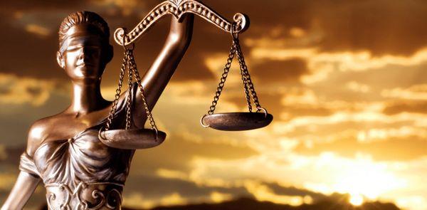 Balancing the scales of justice while blind to socioeconomic status.