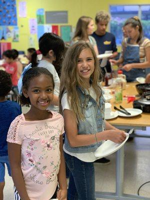 Our students enjoying French cooking class during our 2019 OC French Summer Camp.