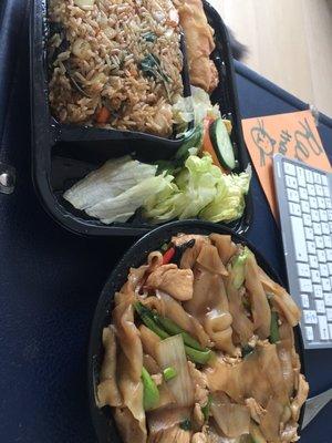 Lunch special of basil fried rice, and entree of chicken pad see ew for 20$.