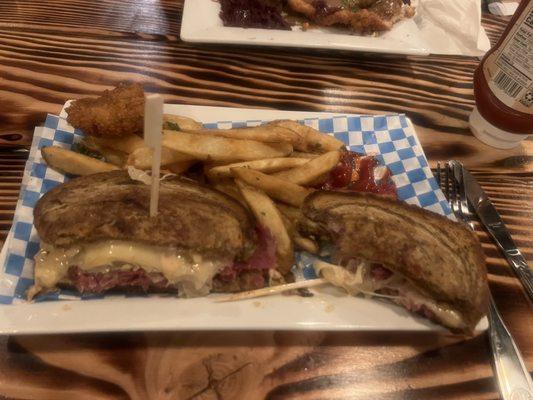 East Coast Rueben Sandwich with fries.