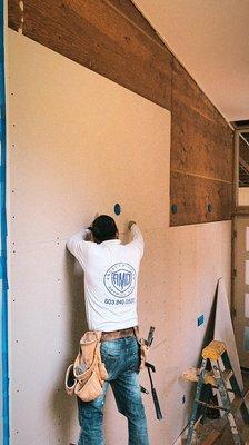 Hanging some drywall!