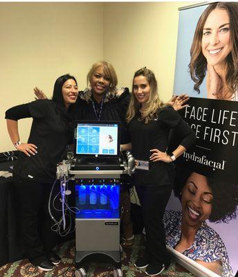 We offer the Hydrafacial MD. Pictured her our esthetician refreshing her certification October 2018