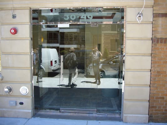 A glass entrance we installed.  Sandblasted the address into the transom.