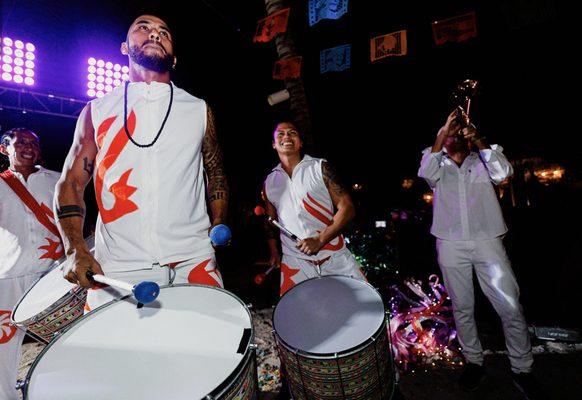 Surprise Brazilian drum and horn performance.  The drummers lead a parade of our guests down the street to an after party.