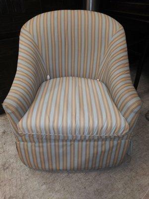 Accent chair with skirt