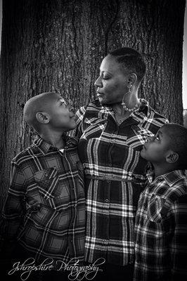 Family shoot. A mother loving hers sons.