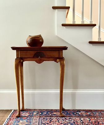 A subtle color change between the walls and trim to keep this entry way light and bright.